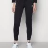 Nike Sportswear CLUB PANT TIGHT - Jogginghose - Black/white