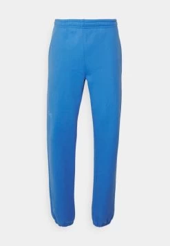 Pinqponq UNISEX - Jogginghose - Cornflower Blue -Frauen Geschäft ceec34c5e0d8411c81add34fdfafd185