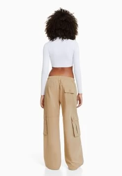 BERSHKA MULTIPOCKET WIDE LEG - Cargohose - Camel -Frauen Geschäft f6fa888f70f9477fa2debbf0ce75e06b